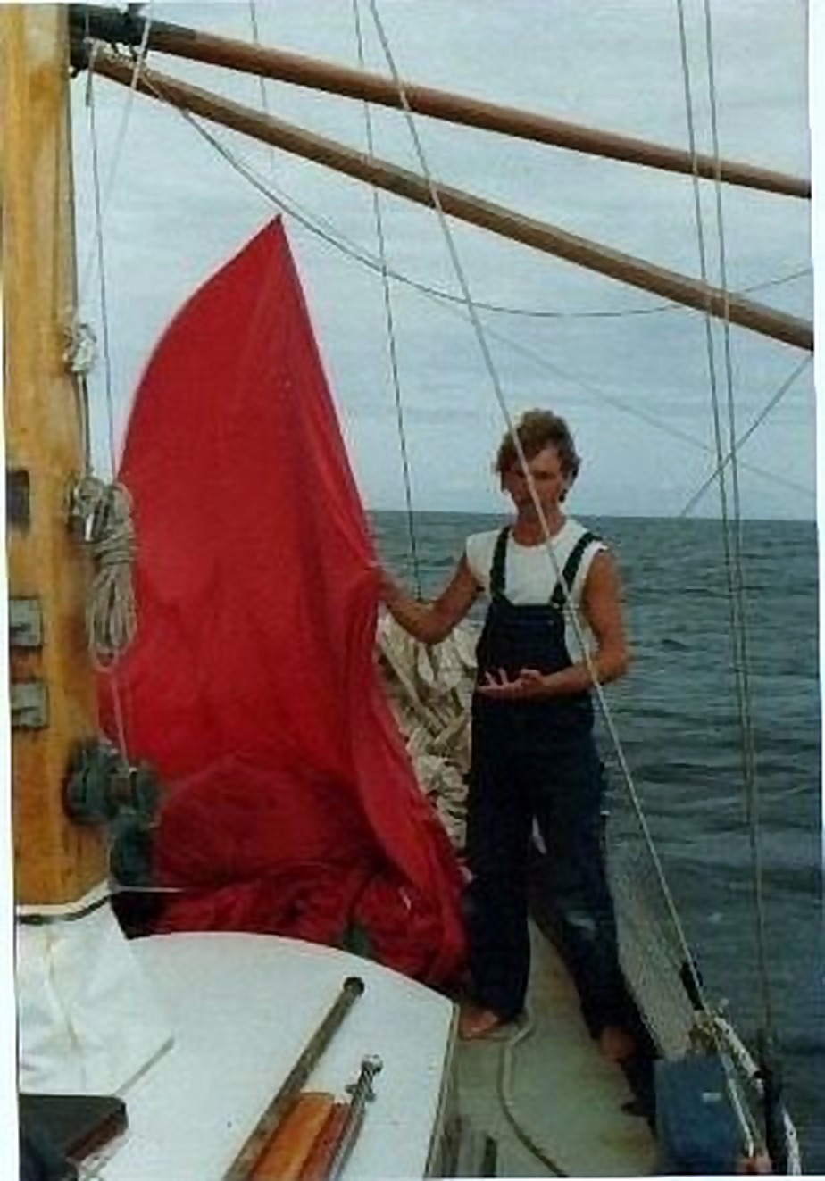M. Brautigam on deck with the red spinnaker